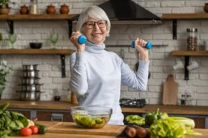 A smiling senior woman holding weights