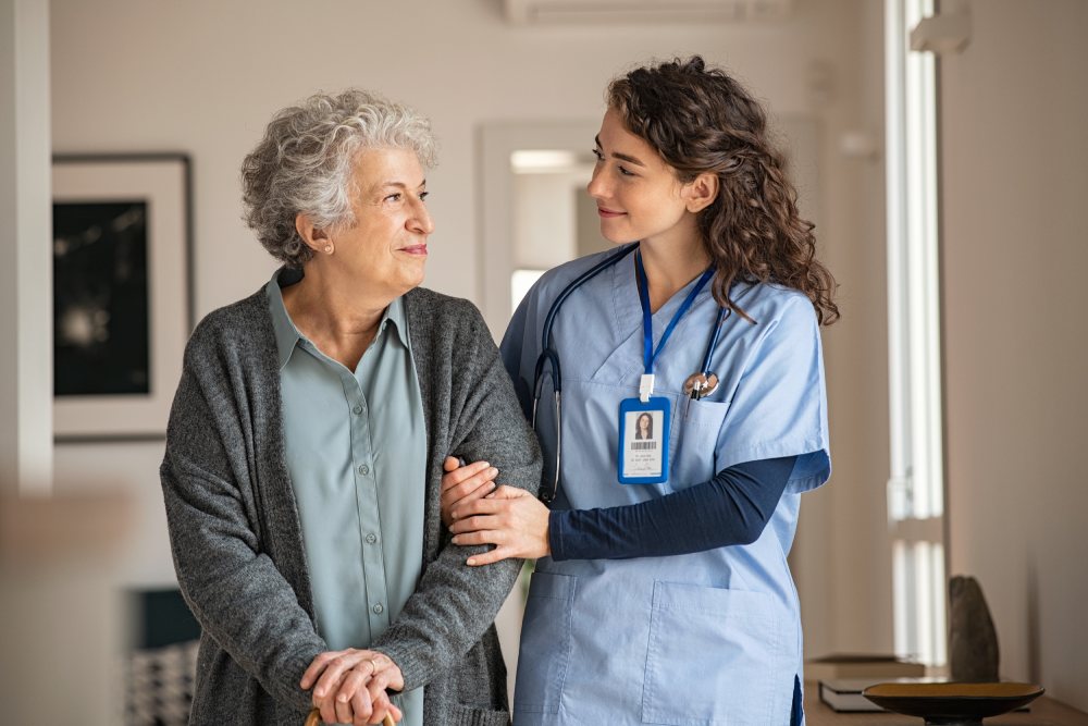 A senior woman with a doctor